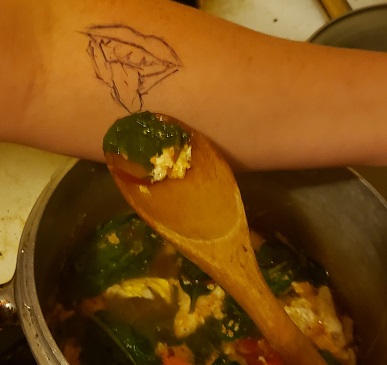 arm mouth being fed